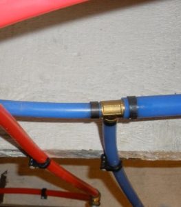 Color_Coded_Plumbing_Pex_Pipe_Close-Up_5-12-10_043.132200725_large